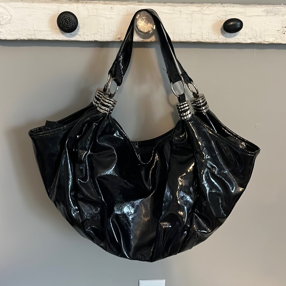 Large shiny black handbag